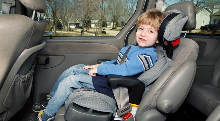 Preschool Age Boy In A Booster Seat