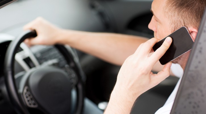 Driver using hand-held cellphone