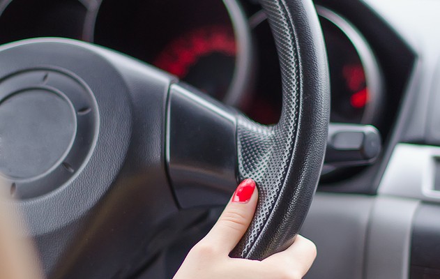 Hands On A Steering Wheel